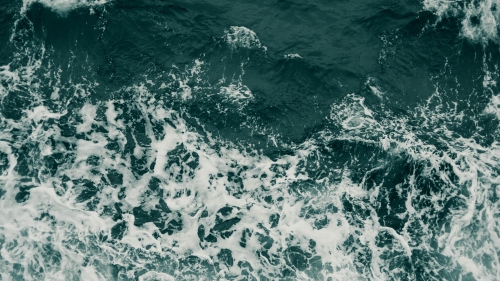 Aerial View on Green Waves on Sea