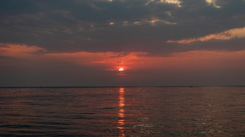 Beautiful Sunlight and Sunset with Glare on Sea