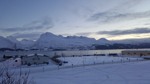 Clouds and Snow Covered Mountain