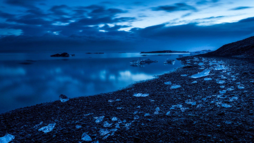 Cloudy Landscape and Stones on Coast