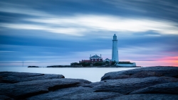 Lighthouse and Clouds in Sky