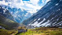 Norway Mountains and Single House in Valley