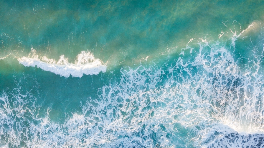 Rocks on Coast and Waves on Sea