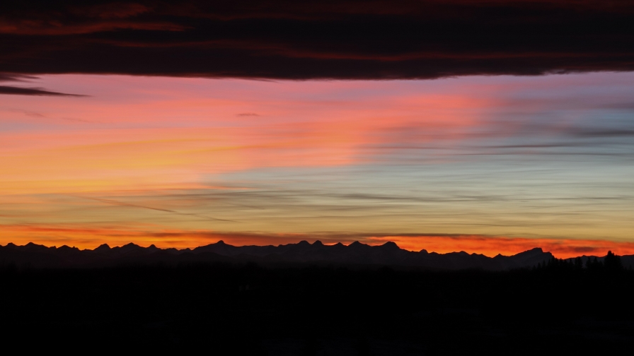 Sunset and Mountains on Background