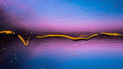 Yellow Spots of Paint on Glass